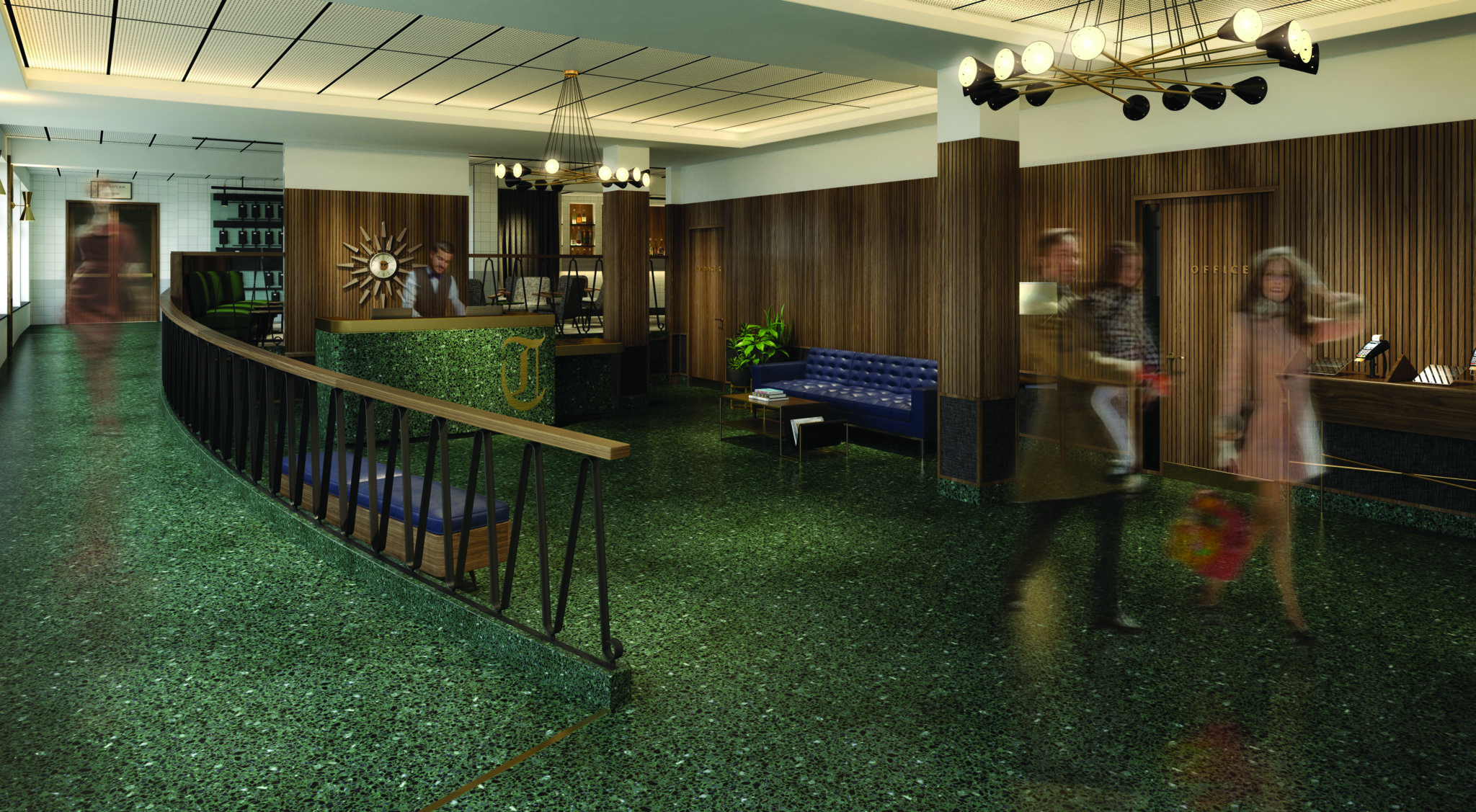 Reception area with a green floor, wooden walls and a couple walking through.